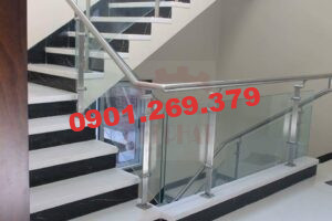 tay vịn cầu thang inox tròn cho cầu thang kính